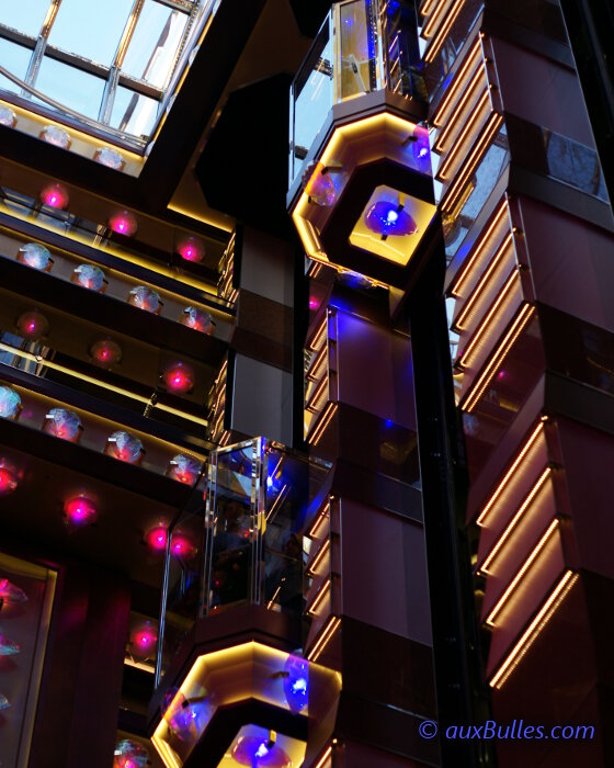 View of the grand atrium of the Costa Fascinosa cruise ship with its panoramic glass elevators View of the grand atrium of the Costa Fascinosa cruise ship with its panoramic glass elevators