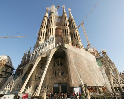 The Sagrada Familia reveals itself from the Passion facade