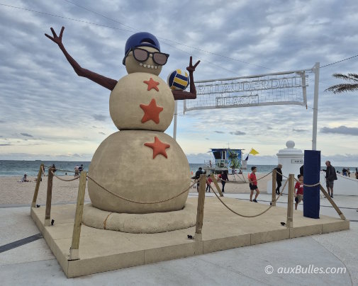 The massive snowman, nicknamed Olas, stands about 20 feet tall facing the beach in Fort Lauderdale