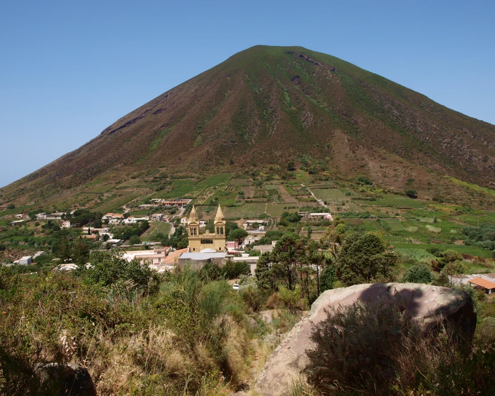 The Sanctuary of Madonna del Terzito in Valdichiesa, with Mount Fossa delle Felci in the background on Salina Island