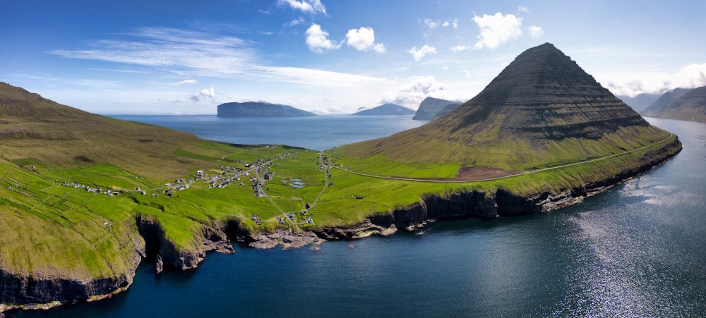 Aerial view of Vidareidi and Cape Enniberg, in the north of the Faroe islands, between dramatic cliffs and the Atlantic ocean