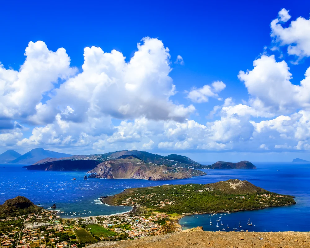 The Vulcanello peninsula in the foreground with Lipari Island in the background, viewed from Vulcano Island in the Aeolian Islands